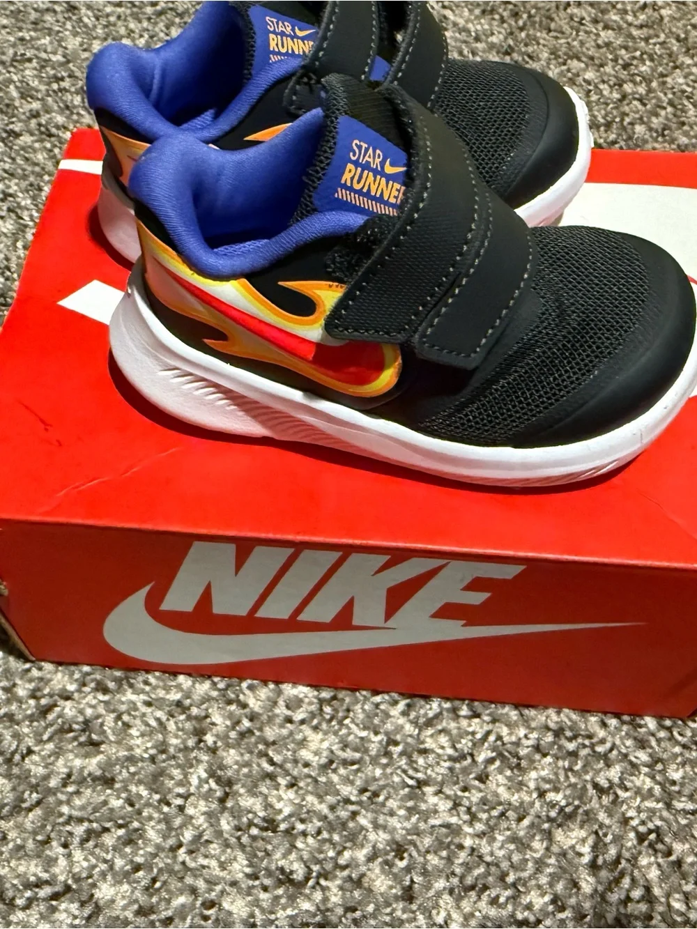 Nike Kids Black Sneakers with Red & Yellow Flame Accent